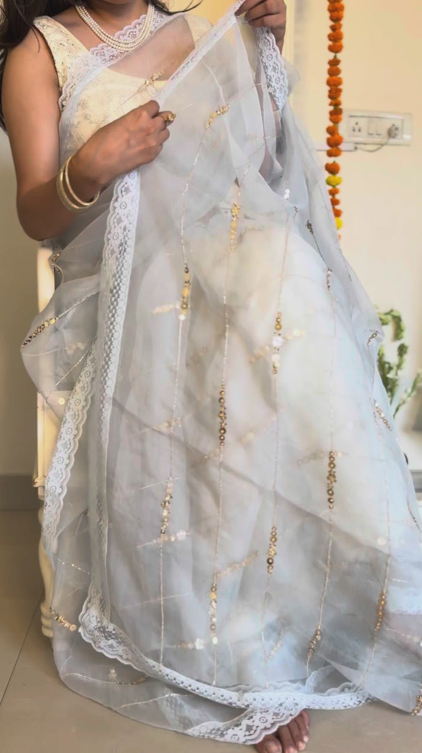 Pastel blue sequin saree