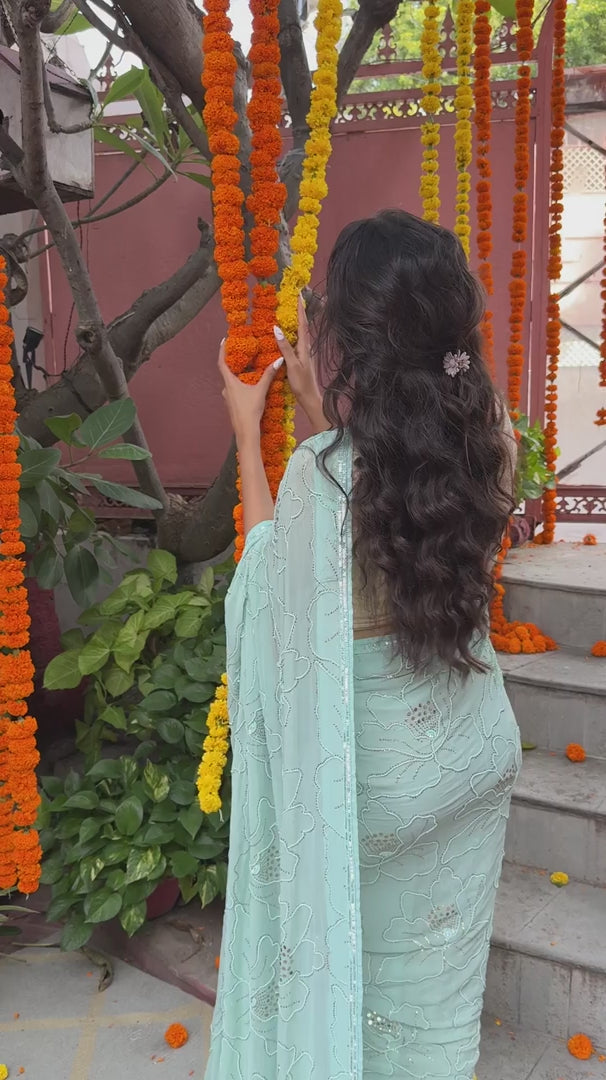 Handcrafted Jaal Mukaish Powder Blue Saree with Magnolia Motifs